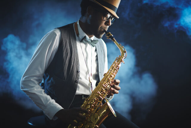 A man playing the saxophone