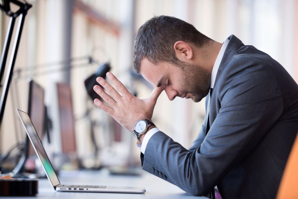 a man stressed out at work 